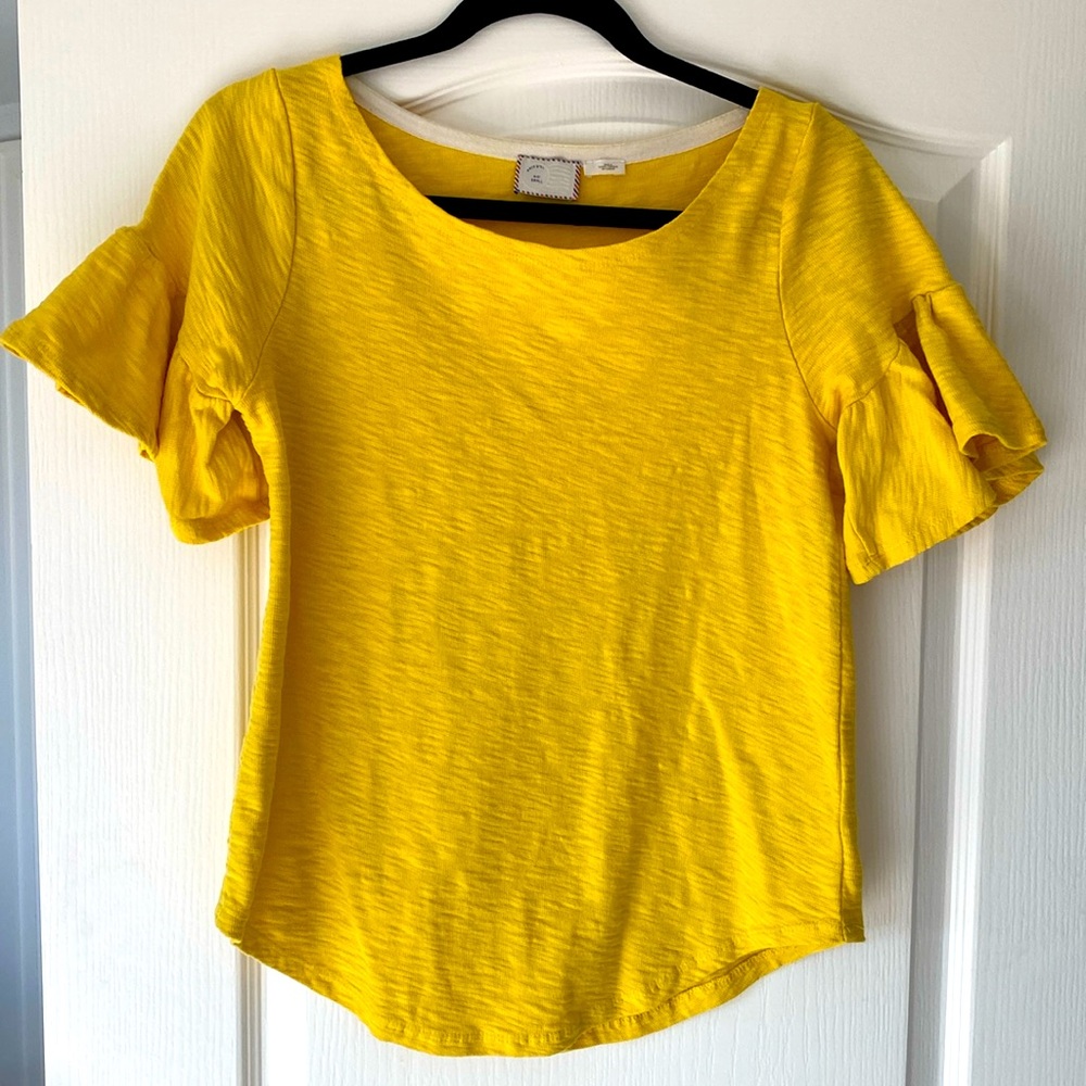 Yellow ruffled t-shirt by 9-HIS STCL from Anthropologie.